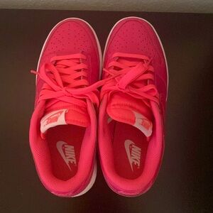Pink Nike low dunk shoes